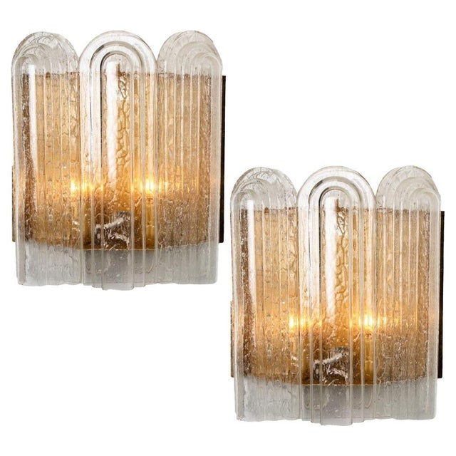 Blown glass wall sconce is designed and manufactured by the iconic firm of doria leuchten, germany in 1960. It is designed...