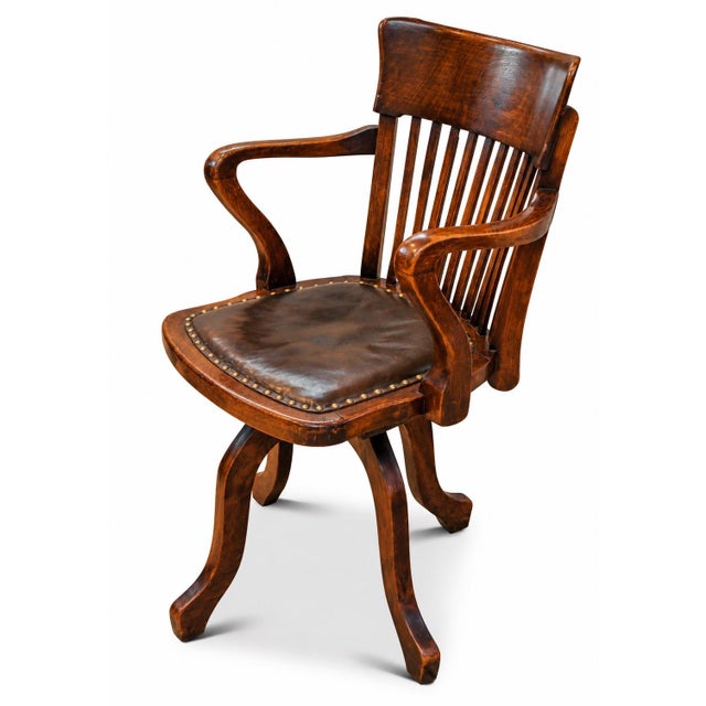 Victorian English Antique Oak & Leather Rail Back Revolving Desk Chair With Stud Detailing With a dark Olive green seat. A...