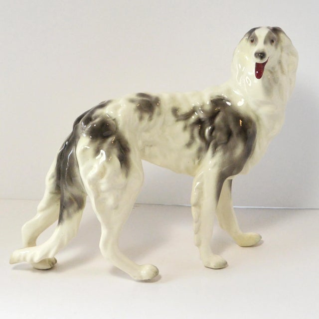 A masterpiece of mid-century American porcelain, this Goldscheider Borzoi is a rare and sophisticated find for the serious...