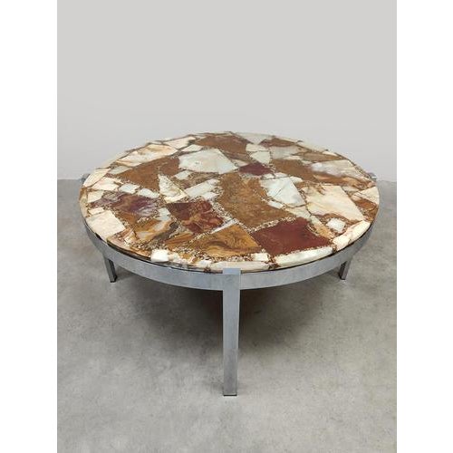 Eclectic vibes with this unique vintage onyx stone coffee table from the 1960s. Country of origin: Italy. The tabletop is...