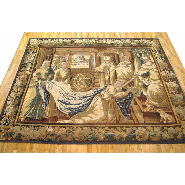 An antique 18th century Flemish Biblical tapestry, size 8'3 H x 10'1 W. This period European tapestry depicts a climactic...