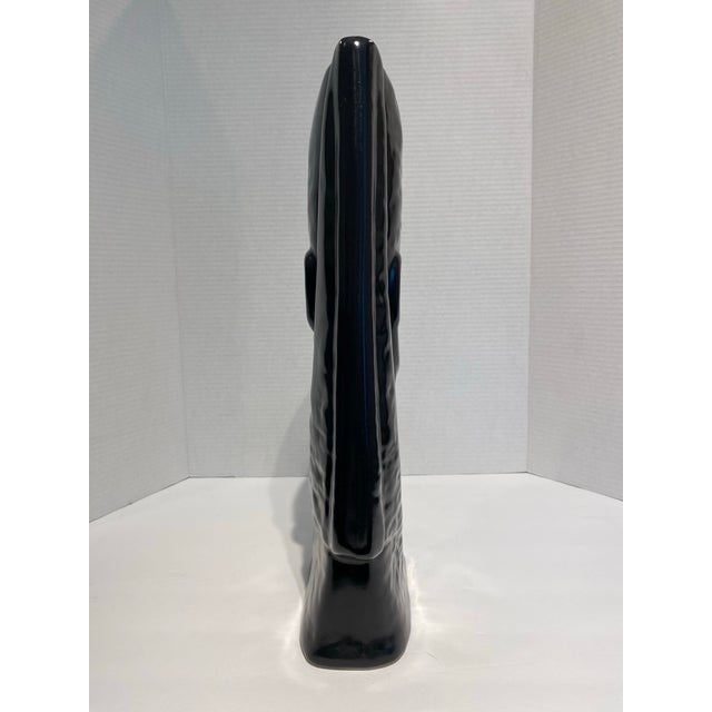 This is a beautiful pottery sculpture of a female bust in the style of Art Deco. The Black finish is lovely in various...