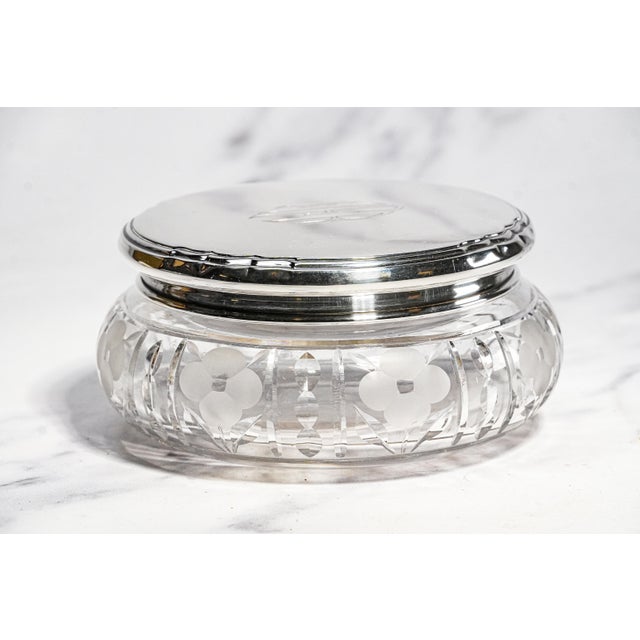 A striking example of Art Deco elegance, this circa 1925 crystal powder jar is an exceptional vanity accessory that...