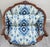 This Antique French Louis XV Carved Walnut French Bergère Armchair from the 18th century is a stunning piece of vintage...