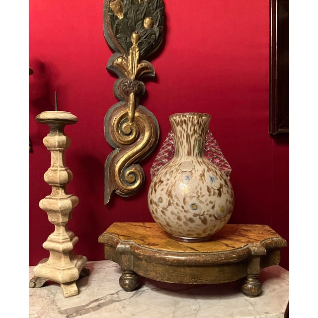 Elegant 19th century Italian carved wood display base or pedestal, hand-lacquered and parcel-gilt, featuring a faux Siena...