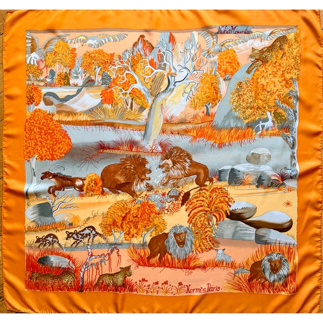 Hermes Nuba Mountain 1997 silk scarf This delightful, colorful scarf depicts the wild world of the savannah. It features...
