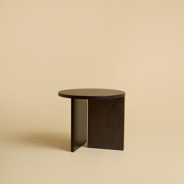 The Kume is a smoked oak side table, a low, compact table that brings the warmth of timber to the range. It offers warmth...