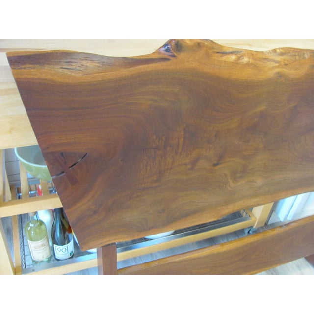 Vintage 1970, Walnut twin headboard from the George Nakashima Studio with the design and plank choice by George Nakashima....