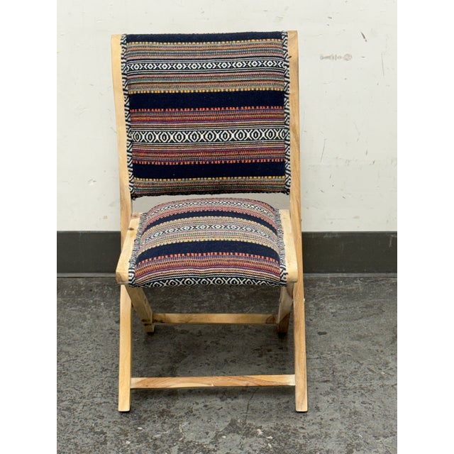 Design Plus Gallery presents a Sonoran Terai Folding Chair from Anthropologie. A folding wood frame is paired with padded...