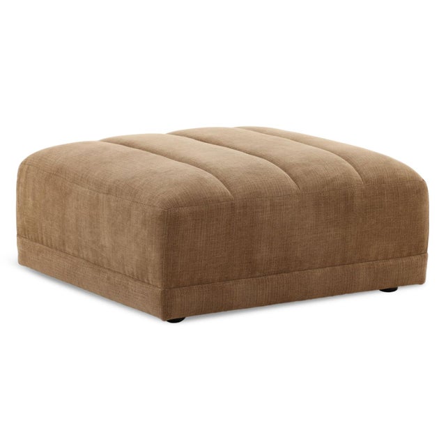 Modern cocoa brown color upholstered ottoman. Basketweave fabric and channel tufted top. Weighs approx. 45 lbs. Matching...