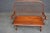 L. Hitchcock Windsor settee bench in a warm cherry finish, featuring an exceptionally tall continuous spindle back, curved...
