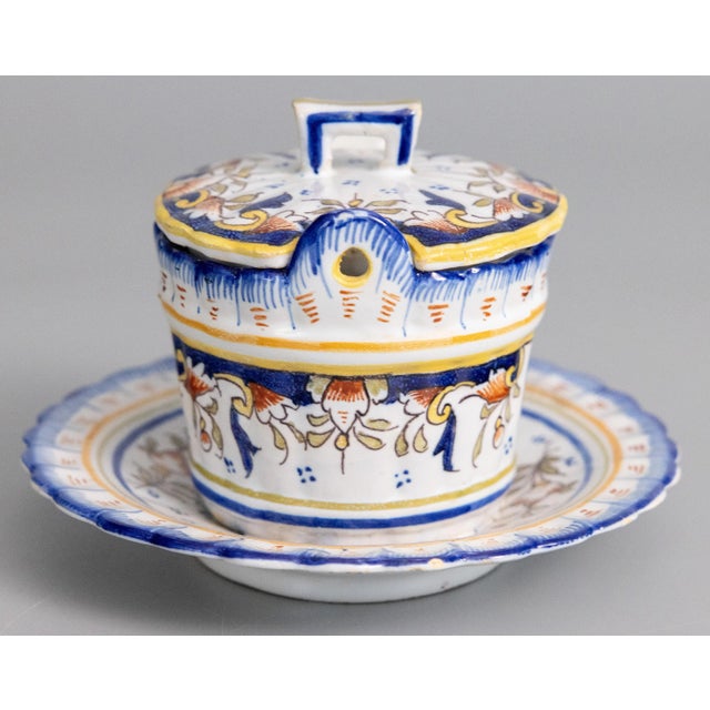 A superb antique French faience Desvres lidded butter bowl dish tureen with attached underplate, circa 1900. Maker's mark...