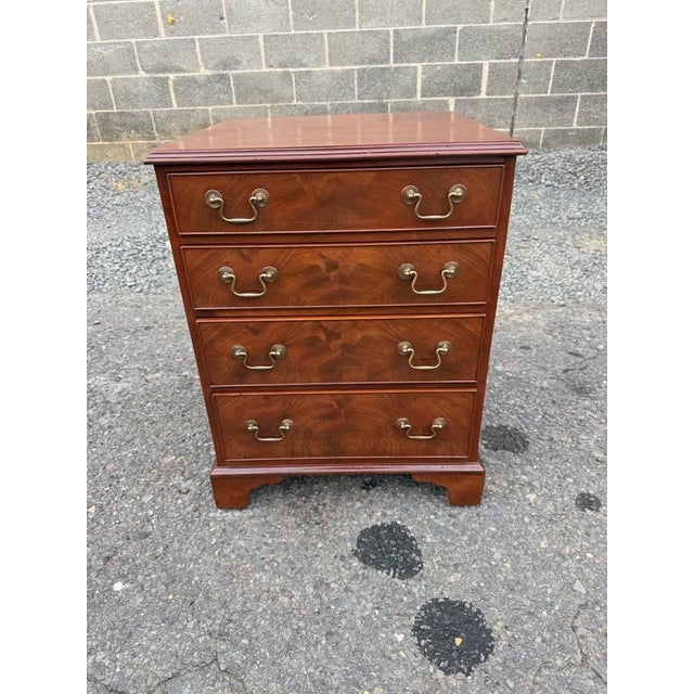 Vintage Georgian Chippendale Style Flame Mahogany Four-Drawer Nightstand. It features flame mahogany veneer, metal...