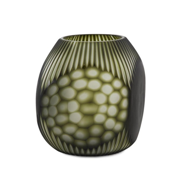 The Cebu vases feature a unique four sided design with intricately cut multiple patterns. Finished in a deep forest green,...