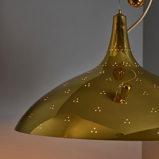 Paavo Tynell 'A1965' Brass and Glass Counterweight Pendant for GUBI Originally designed by Paavo Tynell in 1947, this...