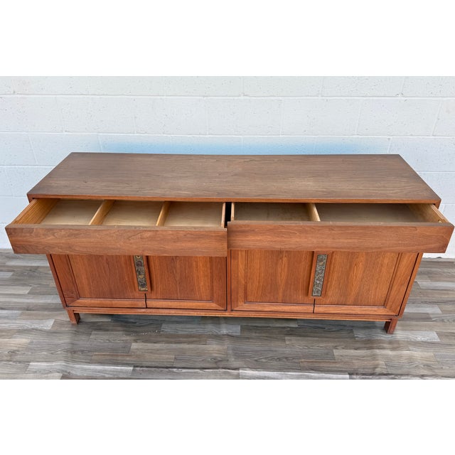 An exceptional Mid-Century Modern walnut credenza designed by John Keal for Brown Saltman, dating to the 1970s. This...
