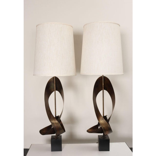Pair of large, elegant table lamps designed by Richard Barr for Laurel (ca. late 1960s, USA). Composed of sculptural torch...