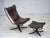1970s, Norwegian design by Sigurd Ressel, lounge chair with footstool, model "Falcon". Furniture leather, canvas, bent...