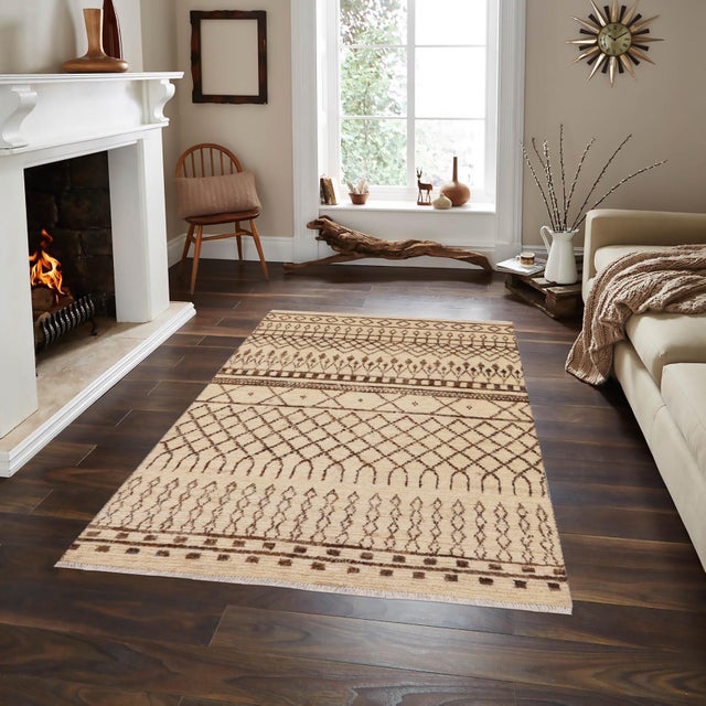 Elevate your space with the timeless artistry of a handmade Moroccan rug, meticulously crafted by skilled artisans using...
