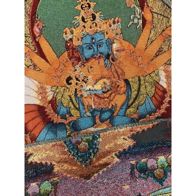 "W-60cm,H-90cm This Xizang Embroidery and Brocade Thangka Buddha Painting is a handmade spiritual home decor piece...