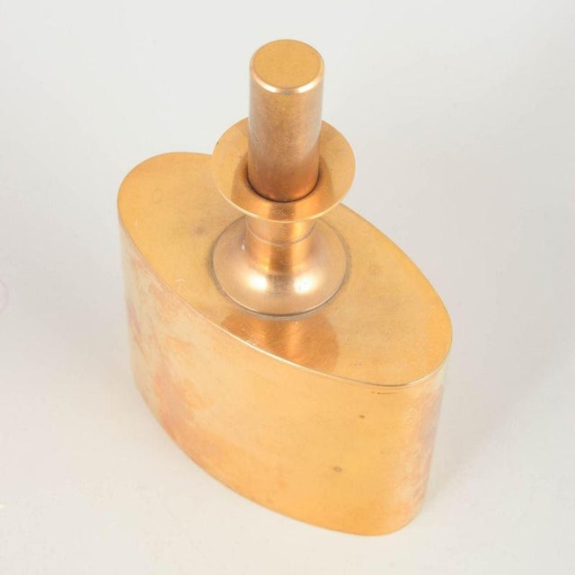 Skultuna 23-carat gold-plated brass hip flask, 1970s. Elegant and sculptural hip flask in brass, 23 carat gold-plated,...