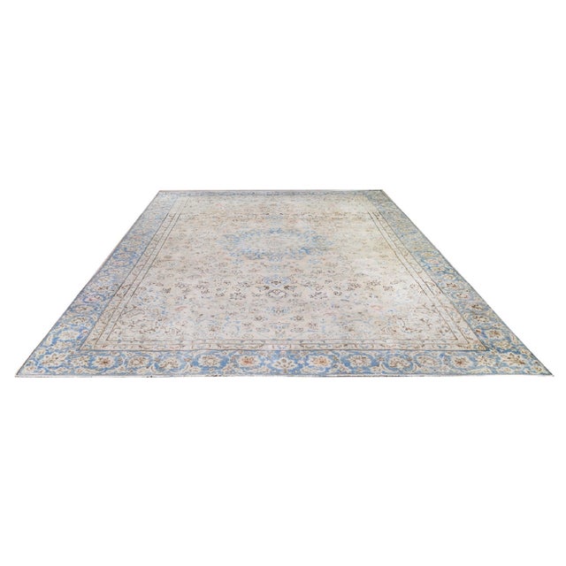 Vintage Hand-knotted with care using traditional rug-making techniques, this wool rug blends timeless craftsmanship with a...