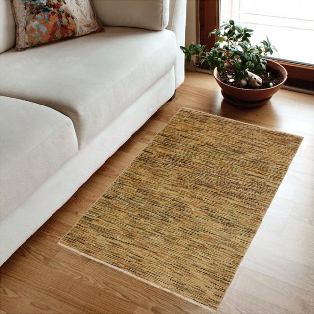 Transform your home's interior with a stunning hand-knotted Gabbeh rug. These rugs are meticulously crafted with bold...