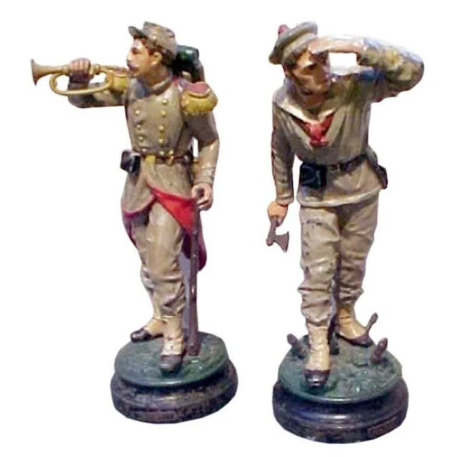 A rare pair of cast metal models of toy soldiers from Bradley and Hubbard Manufacturing Co., Philadelphia, PA....