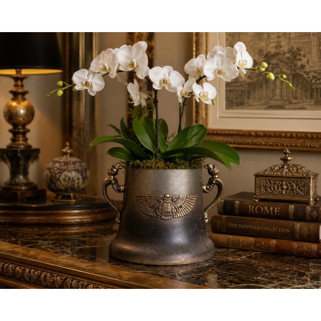 Inspired by the fascination with ancient Egyptian motifs that swept decorative arts during the early twentieth century,...