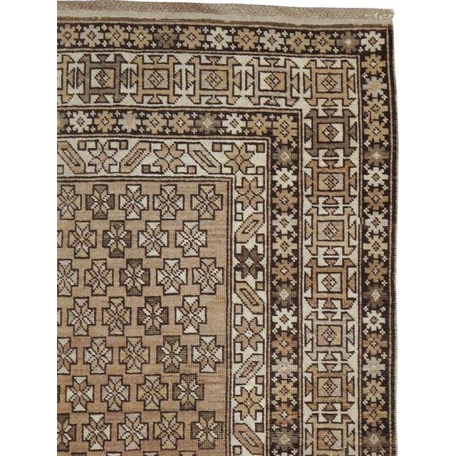 An antique Caucasian Shirvan carpet from the turn of the 20th century. Measures: 4' 2" x 5' 2"