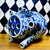 Large blue and white porcelain tulipière featuring a dramatic multi-spout form and cobalt dragon decoration. Standing...