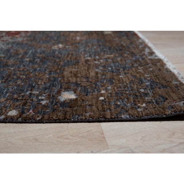 Lydia Lila Multicolor Hand Knotted Wool Rug, Country of Origin: India. This exceptional artistic modern area rug is a...