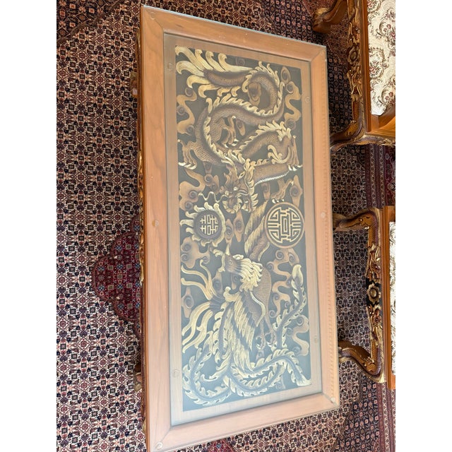 An exquisite hand-carved solid teak wood coffee table imported from Thailand in 2001. This beautifully crafted piece...