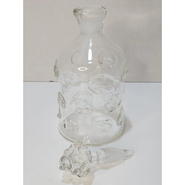 This is such a fun whimsical perfume bottle with applied glass dots on the exterior. The stopper is stunning and sparkles...