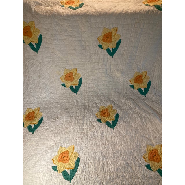 America quilt Characteristics of a 1920s Daffodil Quilt Appliqué Method: Most daffodil quilts from this period use hand-...