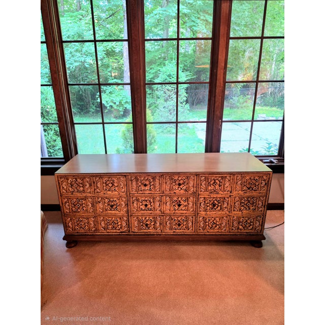 Lovely single owner John Widdicomb carved wood low chest with a Mediterranean motif. Gilt gold highlights and intricately...