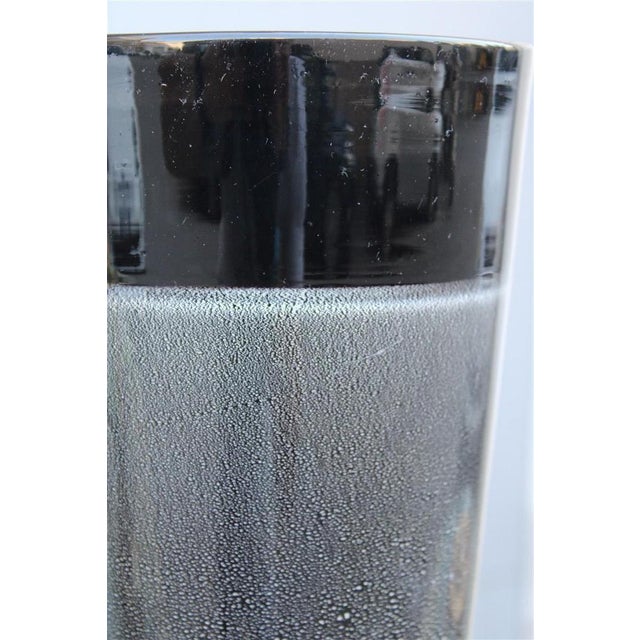 Cylindrical Vase in Black with Silver Dust from Seguso, 1980, in Very Good conditions. Designed 1980 to 1989 This piece is...