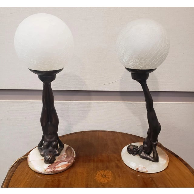 A pair of Art Deco Style Table Lamps with Globe. Rare Reversed Nude. Excellent vintage condition