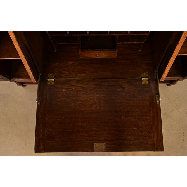 Brown Antique English Jacobean Carved Oak Glass Front Double Bookcase With Bureau and Drop Front Secretary Desk, Circa 1920s For Sale - Image 8 of 14