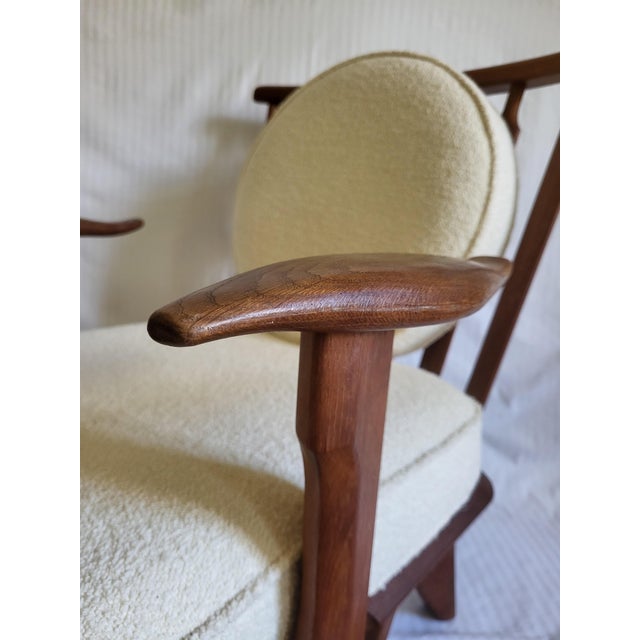 An exceptional pair of mid-century French modern "Catherine" (often referred to as "Petit Repos") lounge armchairs,...