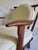 An exceptional pair of mid-century French modern "Catherine" (often referred to as "Petit Repos") lounge armchairs,...