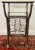 An exquisite vintage wine rack metal table in Vintaged finish. The table has a beveled top glass and can store up to 8...