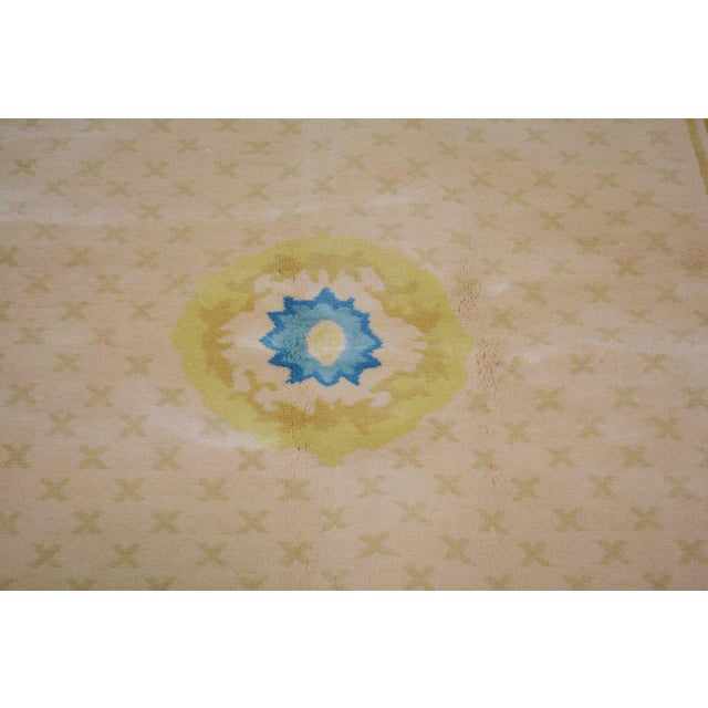 Hand-knotted with care using traditional rug-making techniques, this wool rug blends timeless craftsmanship with a modern...
