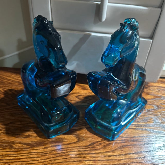 vintage blue glass LE Smith bookends featuring a rearing horse design, standing at 8 inches tall. Made in the United...