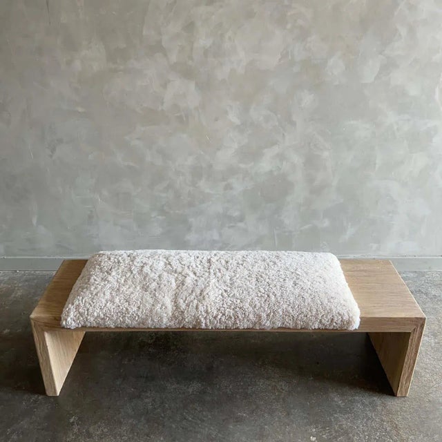The Casi Elm Bench The artisanal construction methods highlight the elm woods beautiful grain pattern & knots and fissures...