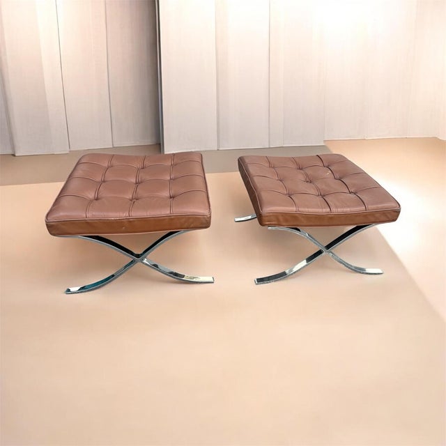 These are a pair of stainless steel miles van der rohe for knoll Barcelona stools, in good condition. The leather has some...