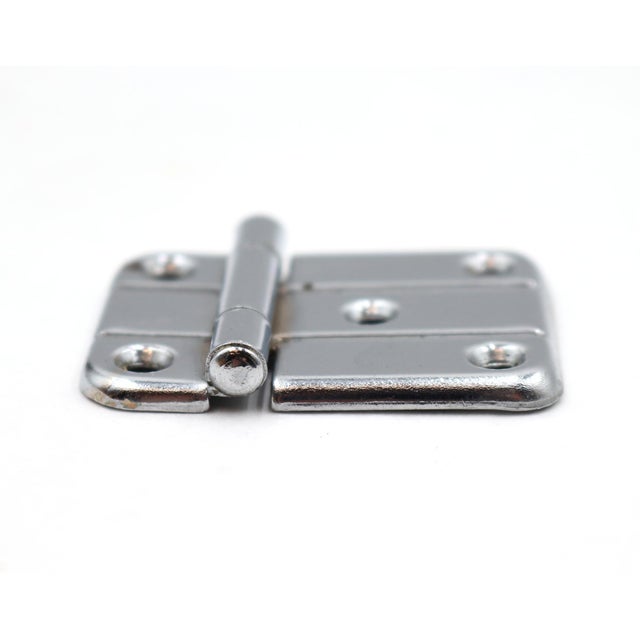 Vintage Art Deco cabinet door hinges made of steel with a chrome finish. The original mounting screws are not available....