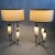 Pair of large mid-century lamps and shades with lit column globes, with cream pongee silk, in polished nickel. Multiple...