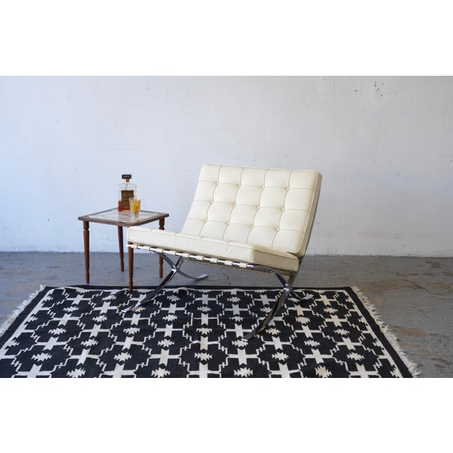 An authentic late 20th century Barcelona Chair by Knoll, originally designed by Ludwig Mies van der Rohe. This iconic...