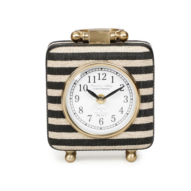 The Mona Accent Clock feels both bold and approachable. Wrapped in black and cream striped cotton jute, it brings texture...